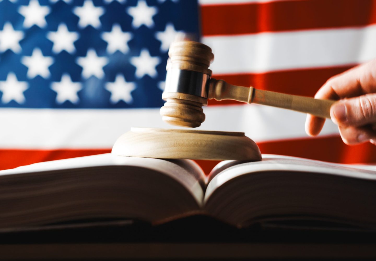 American law symbol with hammer and US flag